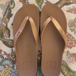 Reef women’s rose gold flip flops